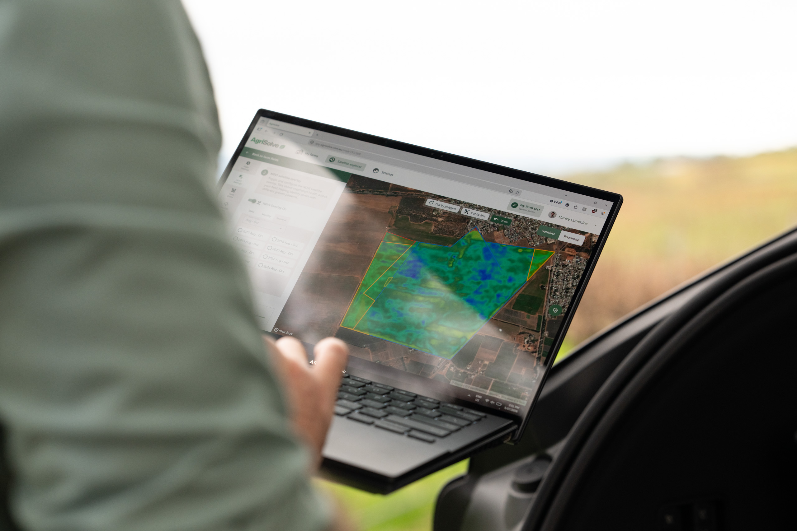 The Agrisolve platform open in the field, showing an NDVI satellite overlay across mapped paddocks